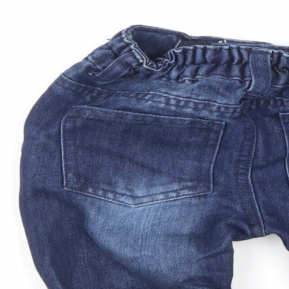 Brand and care label for Primark boys’ blue denim cropped jeans, size 12-18, months