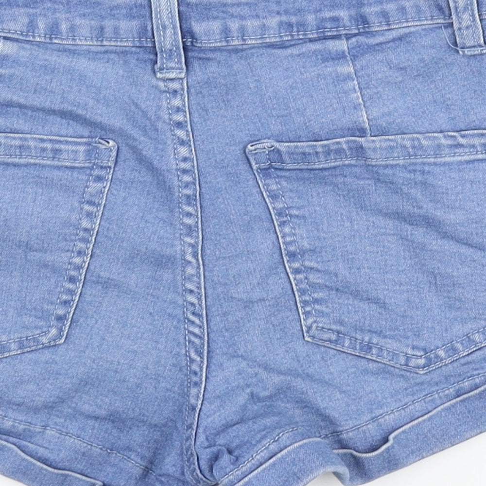 Brand and care label for Forever 21 women’s blue denim hot pants shorts, size UK 24, in