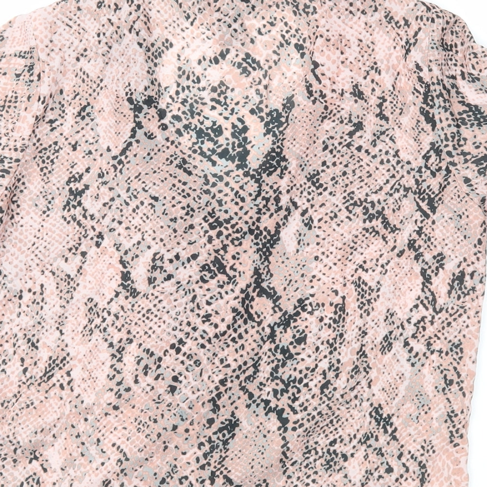 Brand and care label for New Look women’s pink animal print basic blouse, size UK 6