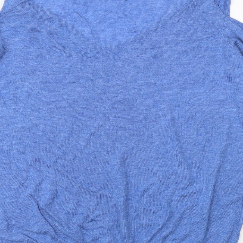 Brand and care label for Mango women’s blue knit jumper, size S