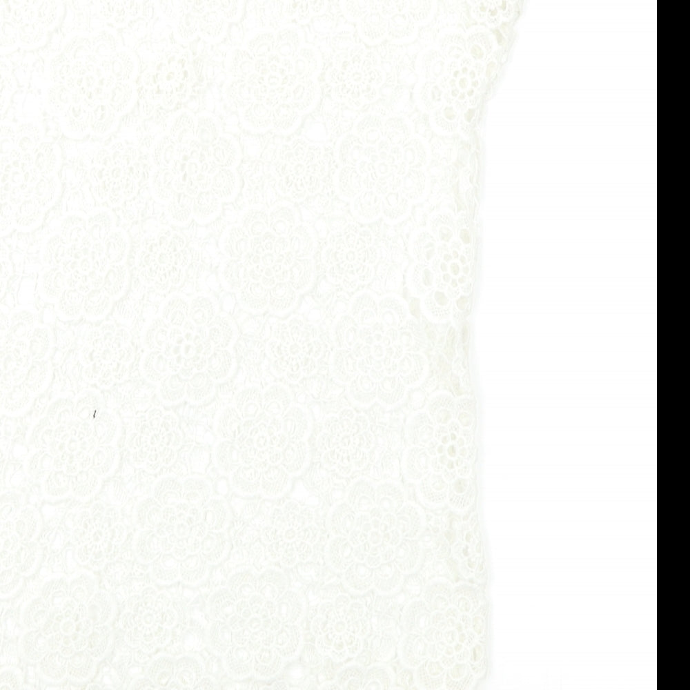 Brand and care label for YD girls’ white floral basic tank, size 7-8, years - open lace