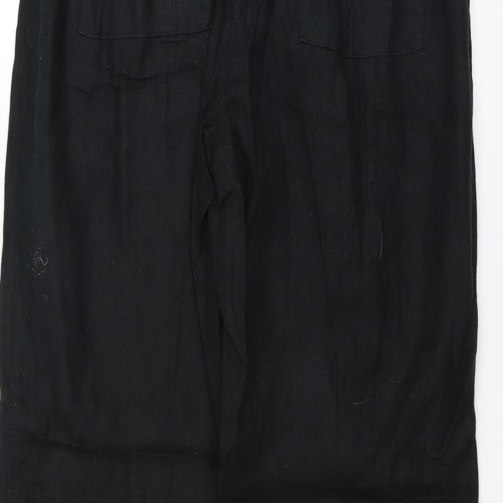 Brand and care label for Preworn women’s beige trousers, size UK 30, in, 30-inch leg