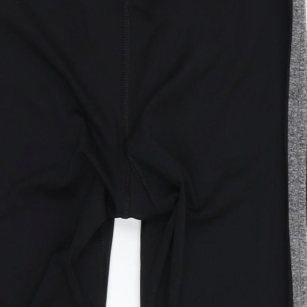 Brand and care label for 90 Degree women’s black biker shorts, size XS