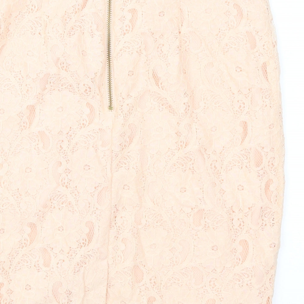 Brand and care label for H&M women’s pink lace straight & pencil skirt, size UK 12