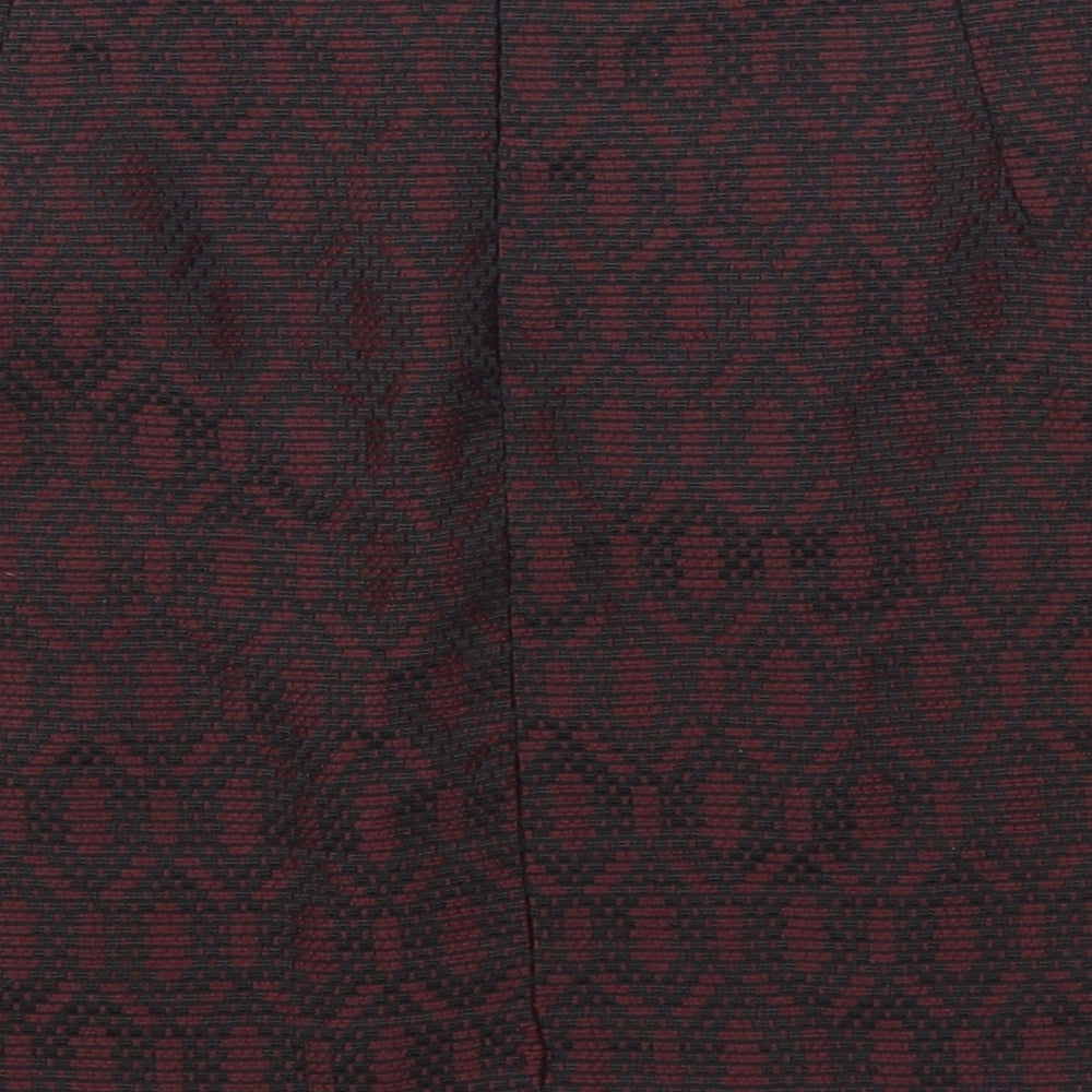 Brand and care label for New Look women’s red geometric mini skirt, size UK 8