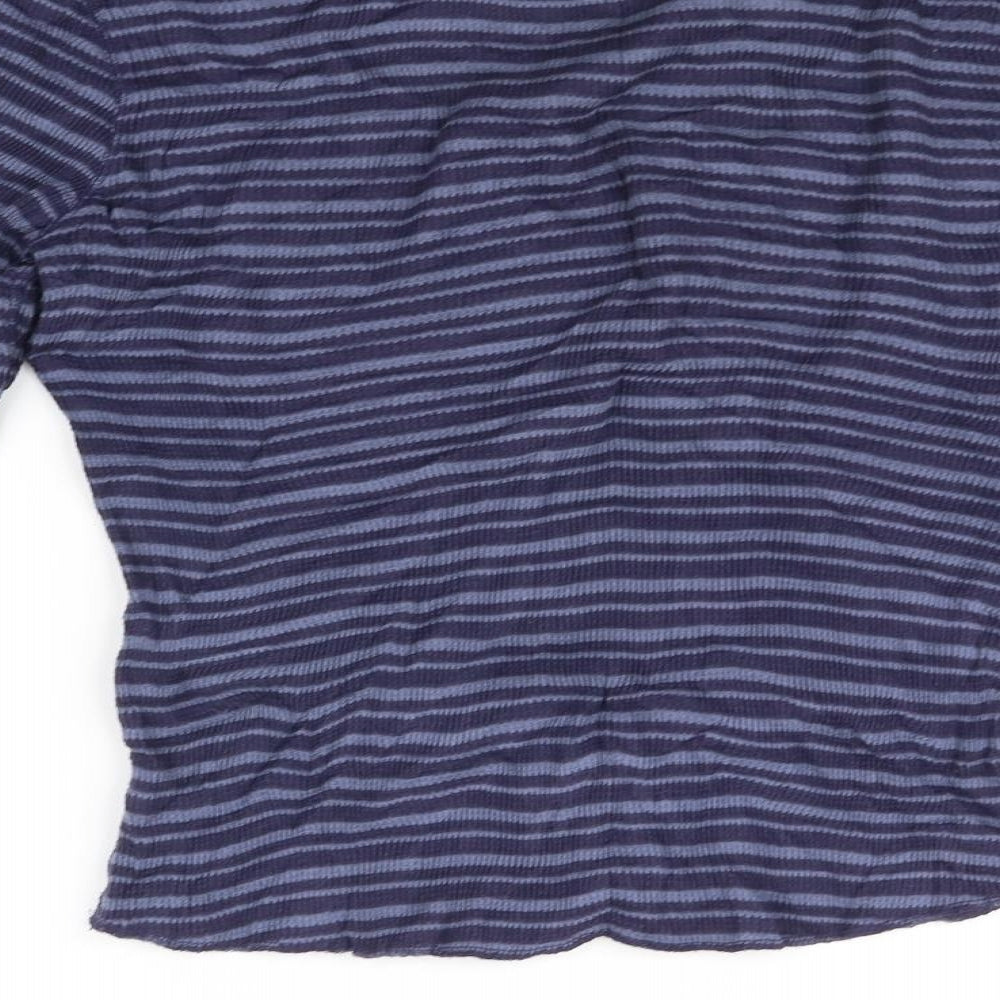 Brand and care label for Gap women’s black striped jumper, size S