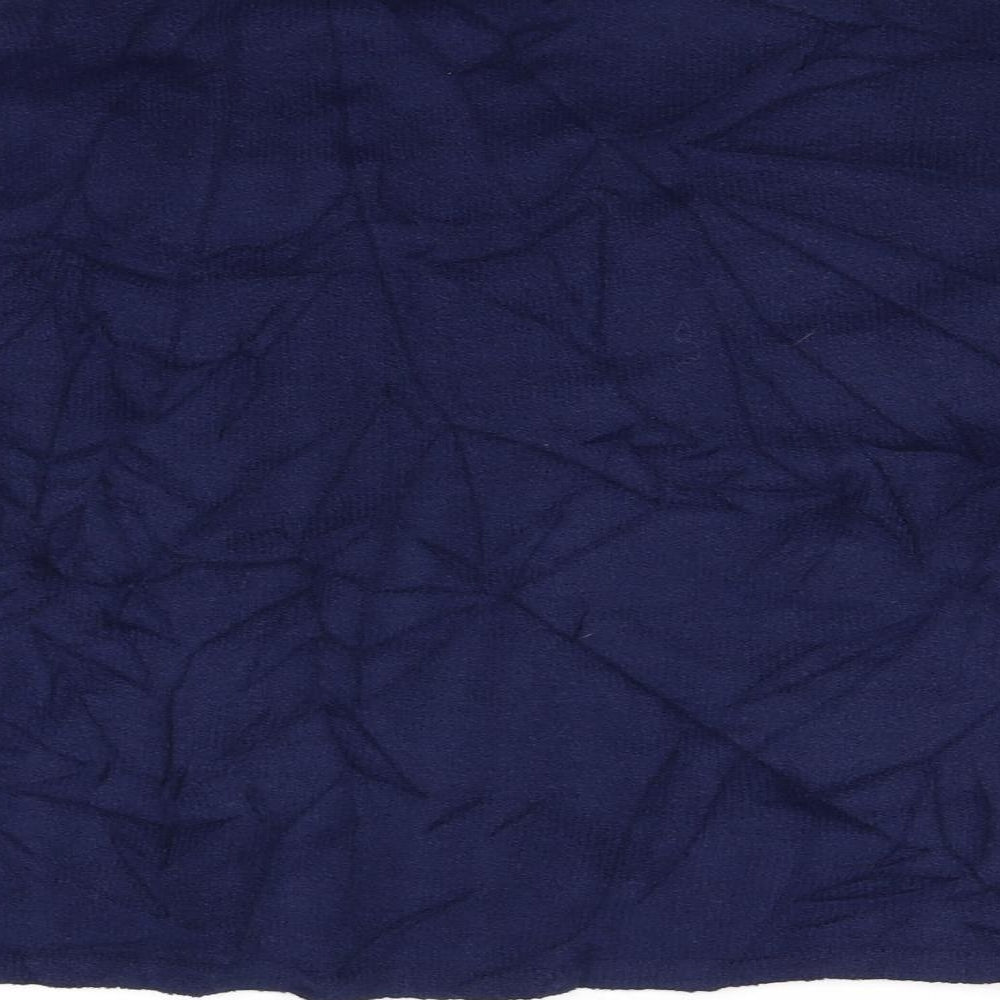 Brand and care label for Sara Neal women’s blue jumper, size UK 18
