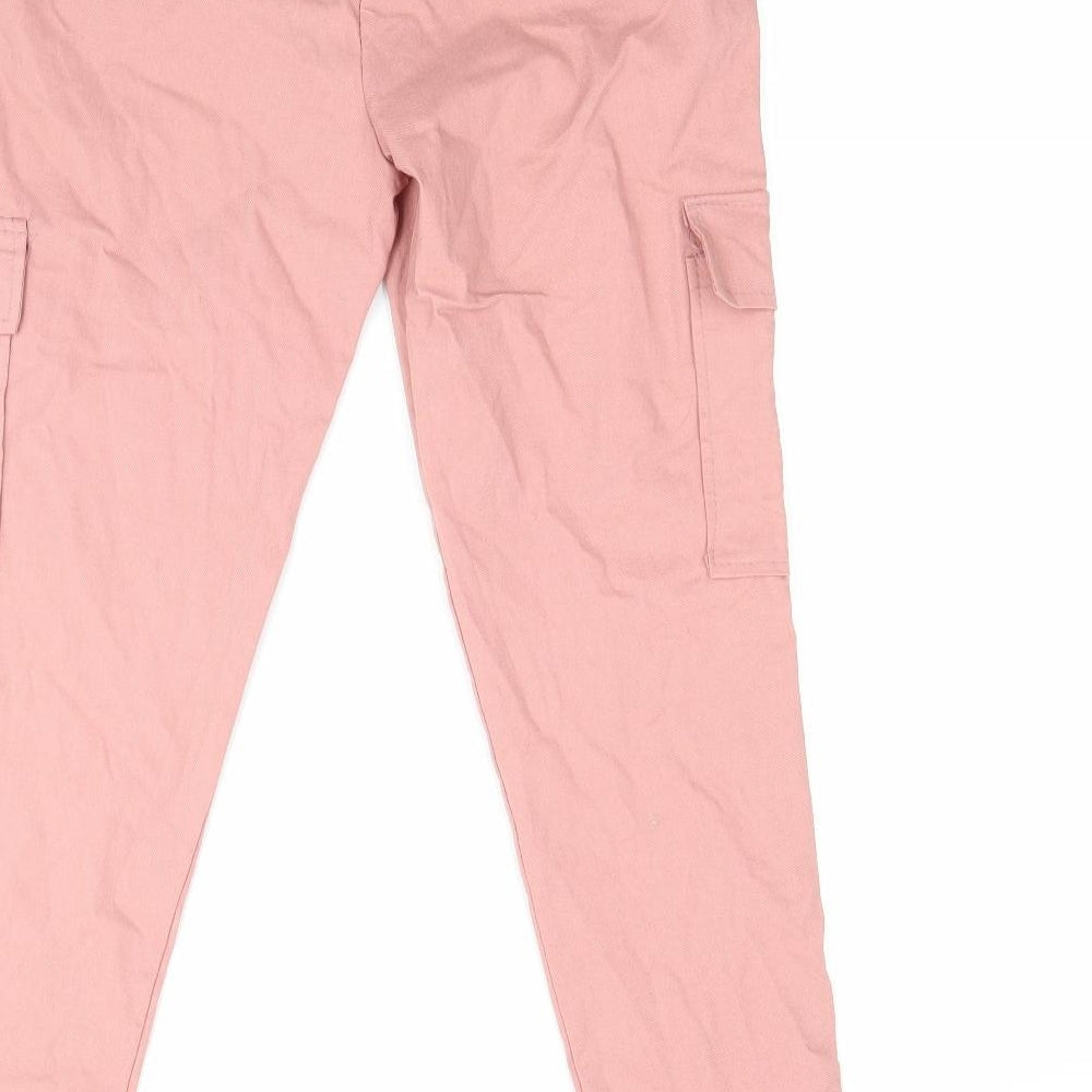 Brand and care label for Preworn girls’ pink jogger trousers, size XL