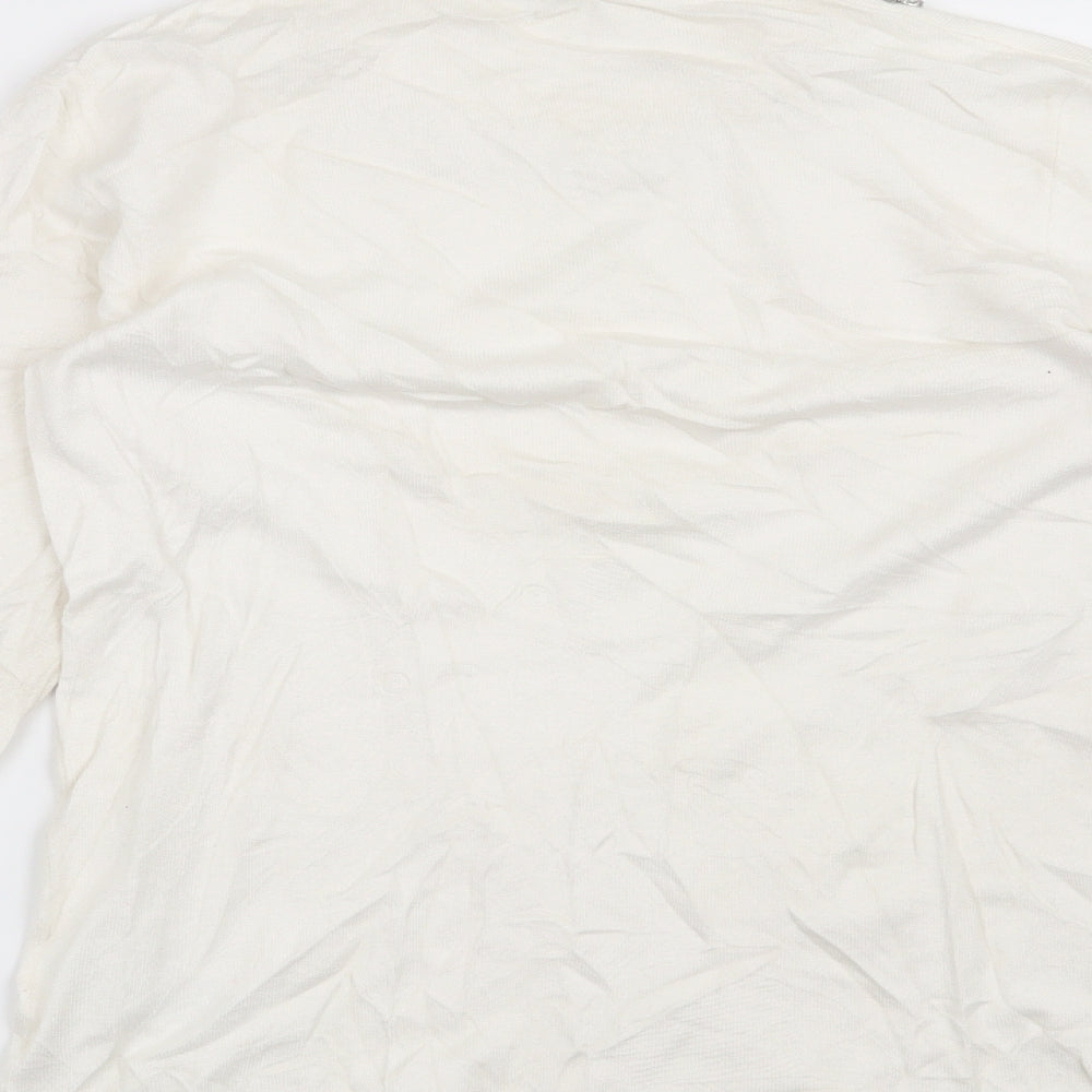 Brand and care label for Warehouse women’s white jumper, size UK 10