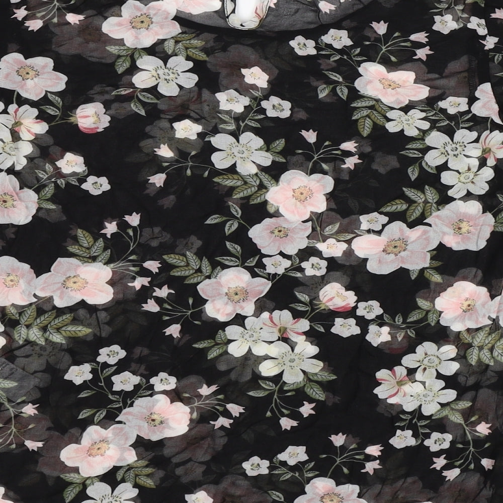 Brand and care label for New Look women’s black floral chiffon basic blouse, size UK 6