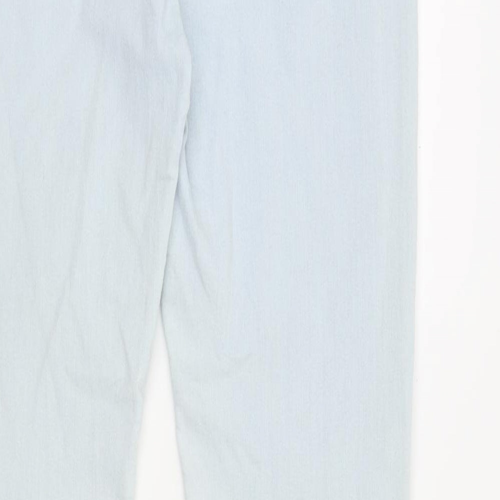 Brand and care label for Candy Couture girls’ blue skinny jeans, size 15, years