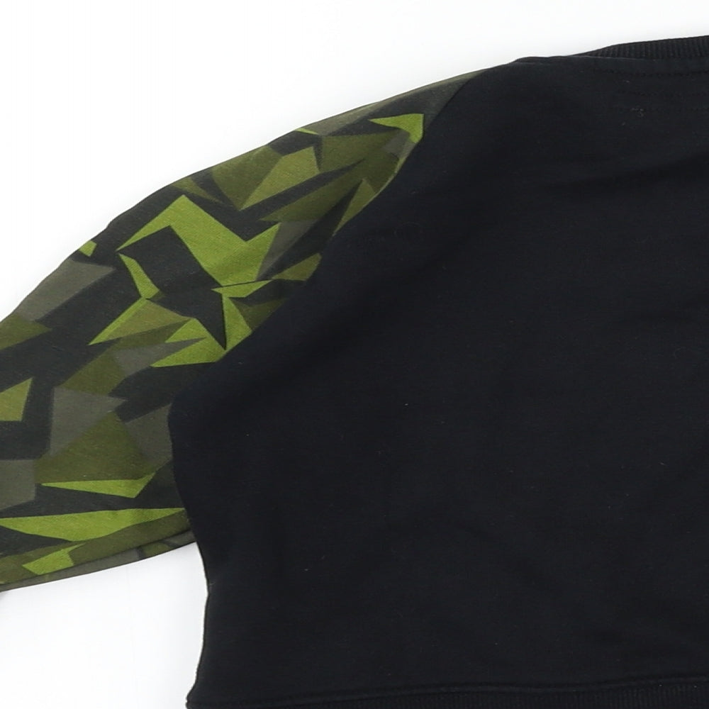 Brand and care label for Next boys’ black geometric pullover sweatshirt, size 3, years