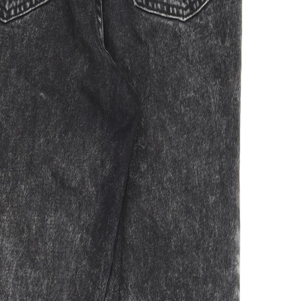Brand and care label for Divided women’s black denim tapered jeans, size UK 8, 25-inch leg