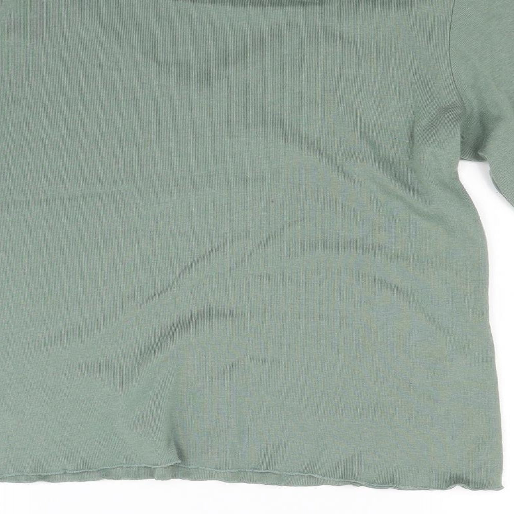 Brand and care label for Viz a Viz women’s green knit jumper, size M