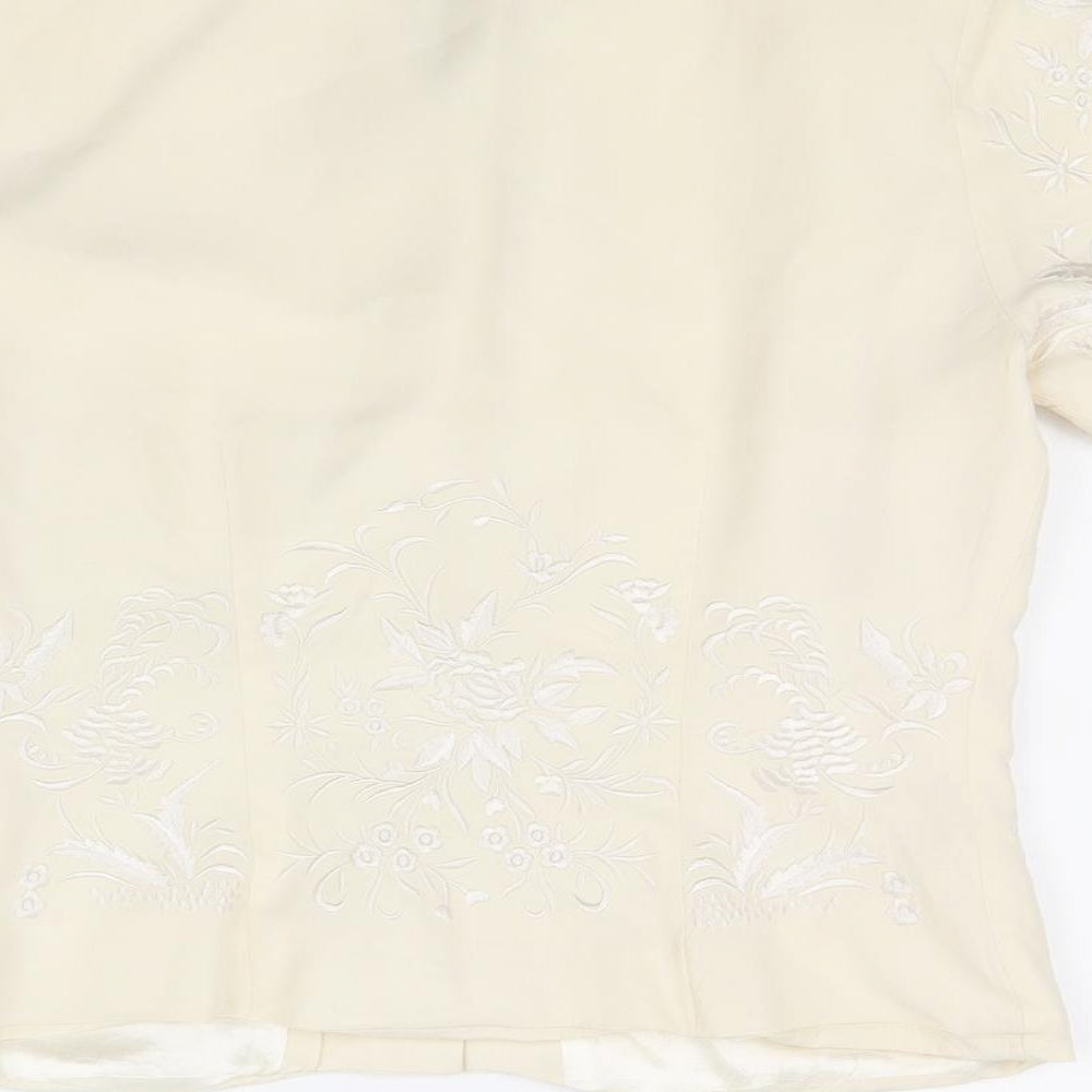Brand and care label for Monsoon women’s beige cardigan jumper, size UK 10