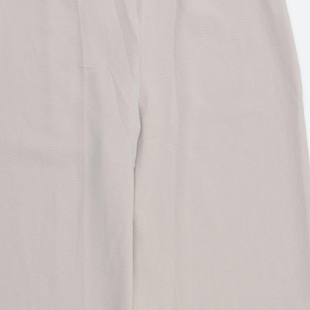 Brand and care label for Boohoo women’s purple trousers, size UK 12, 23-inch leg