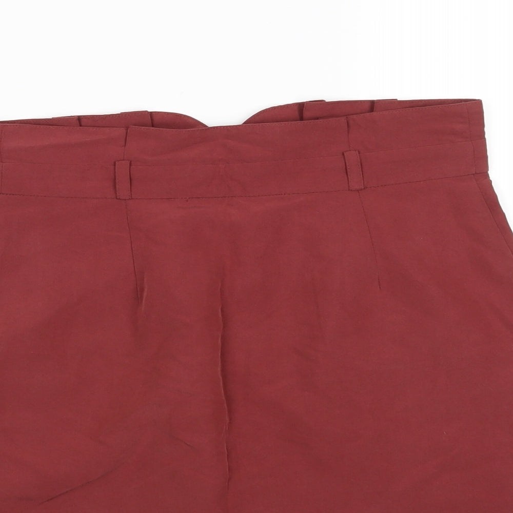 Brand and care label for Pins & Needles women’s red a-line set, size S