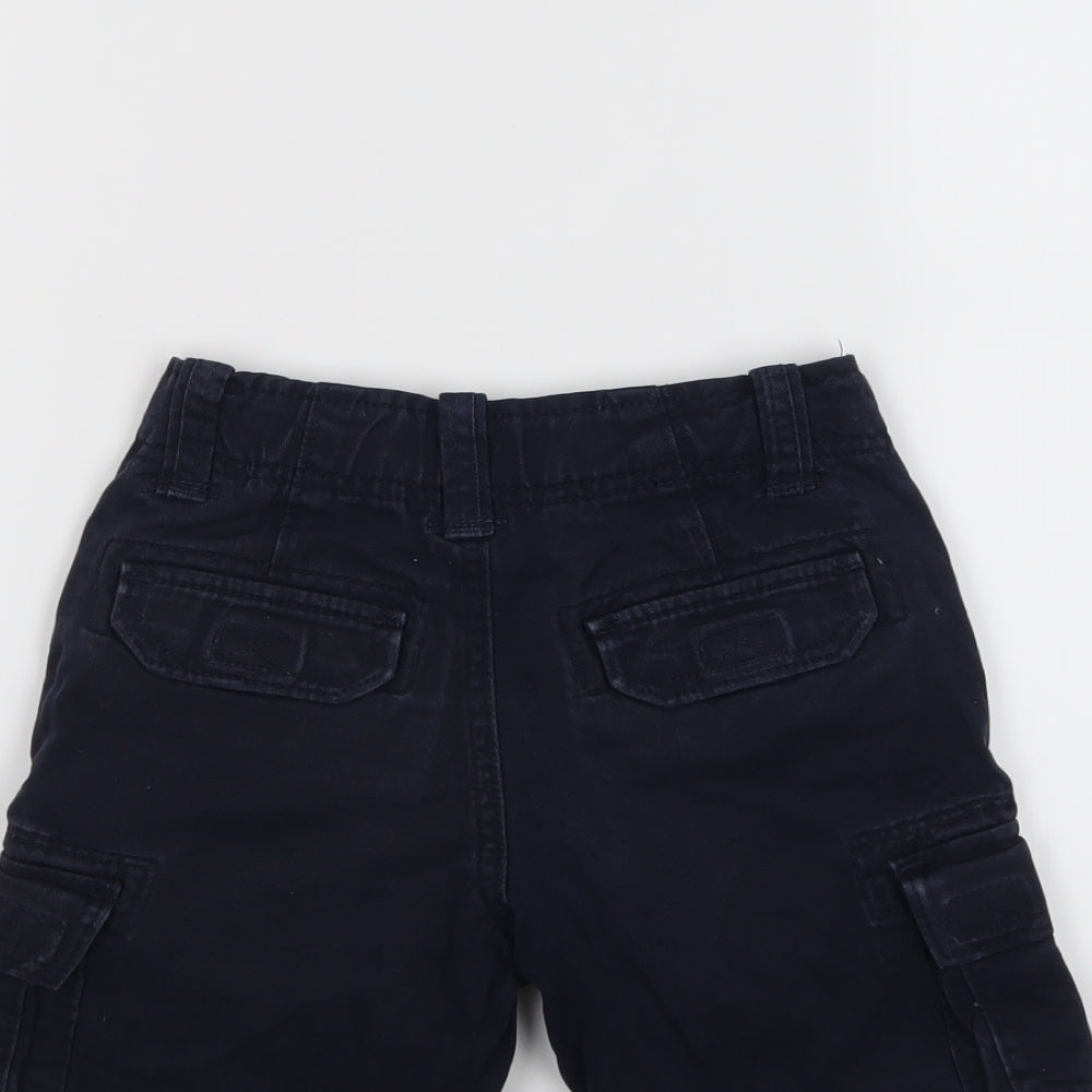 Brand and care label for Gap boys’ blue denim cropped jeans, size 5, years