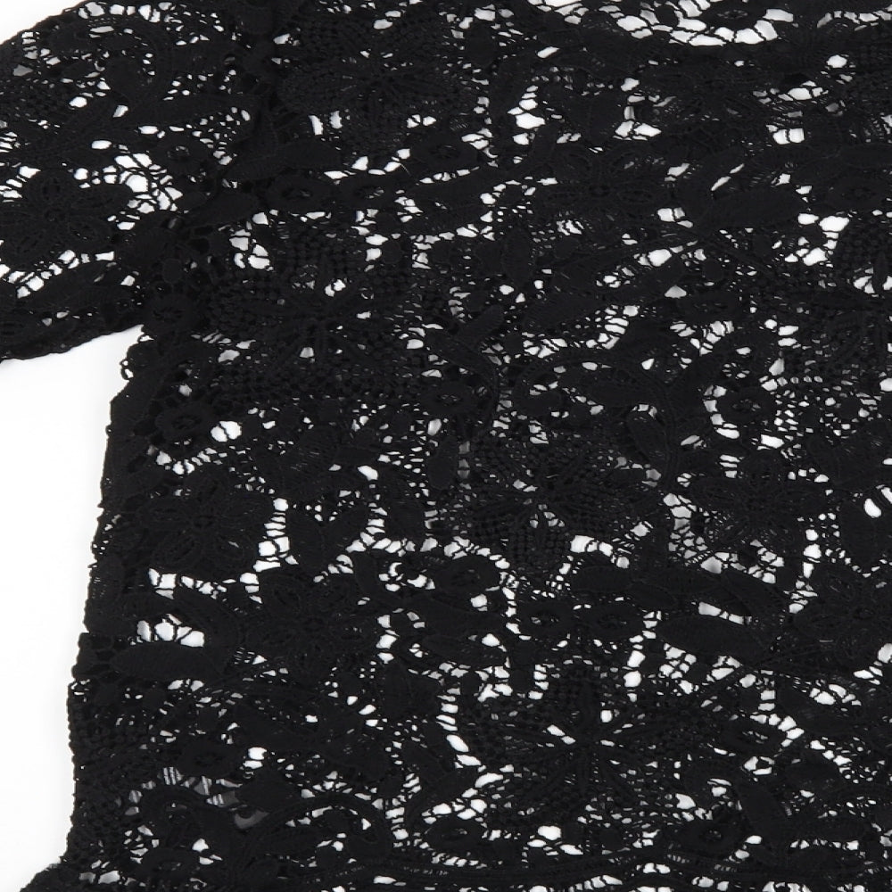 Brand and care label for Cellbes women’s black floral tunic blouse, size UK 10
