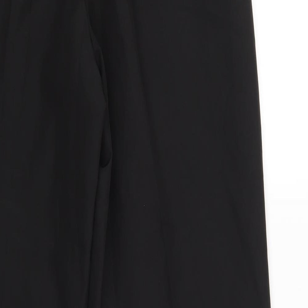 Brand and care label for Preworn men’s black windbreaker trousers, size 28, in, 30-inch leg - elastic waist