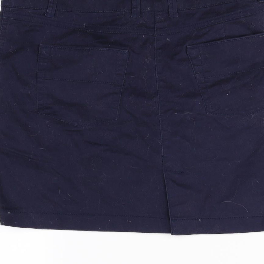 Brand and care label for Casual women’s blue mini skirt, size UK 8
