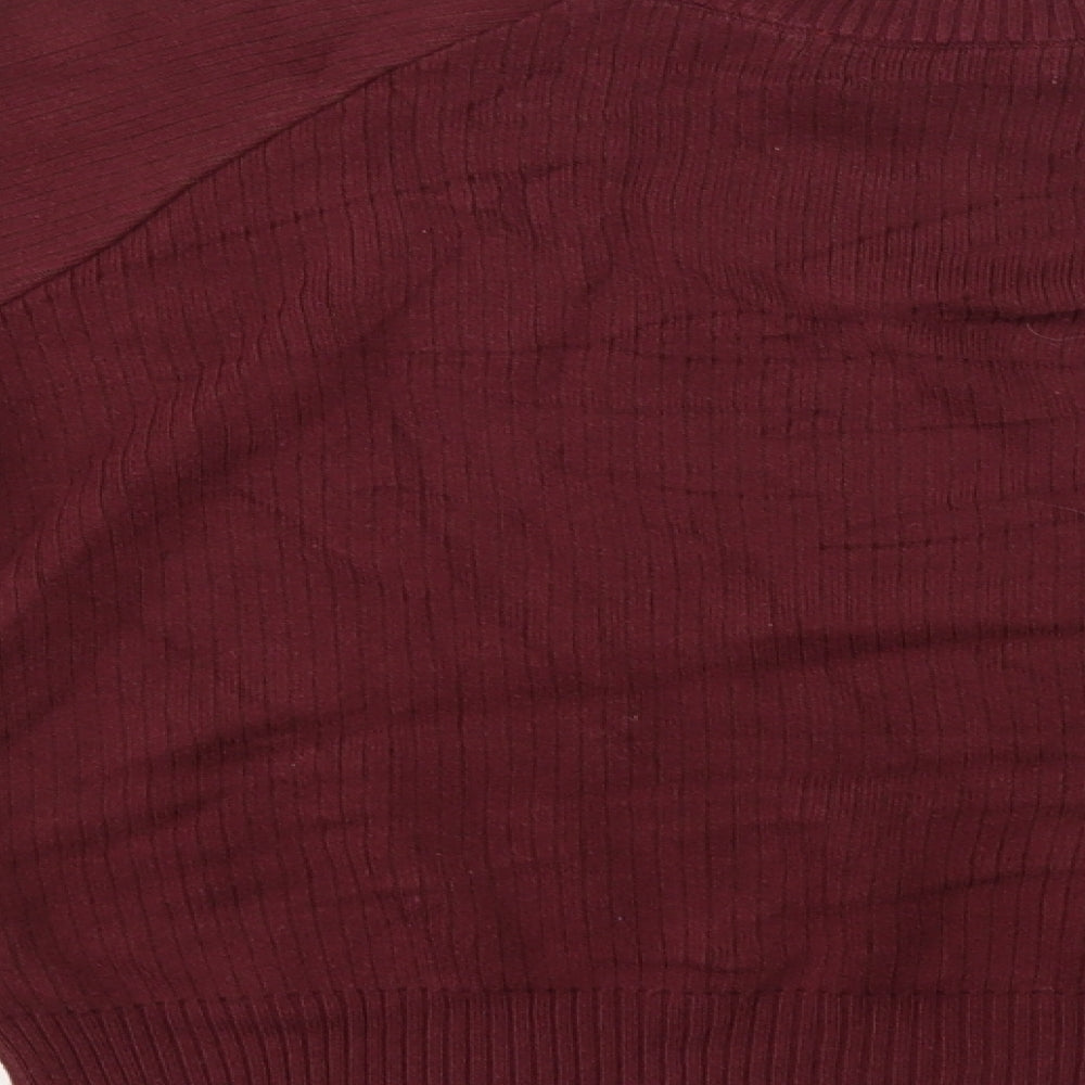 Brand and care label for Mango women’s red jumper, size UK 4