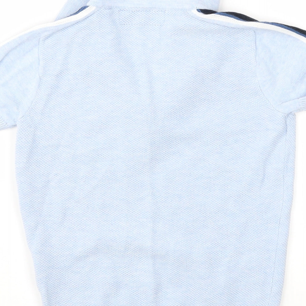 Brand and care label for Next boys’ blue basic polo, size 4, years