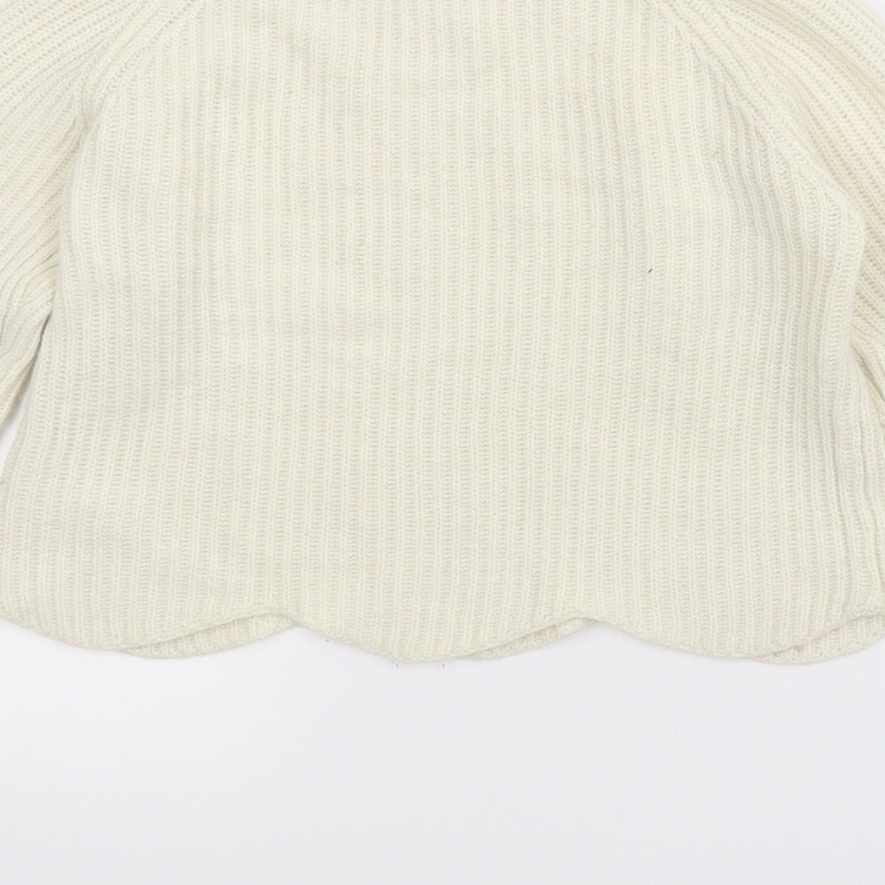 Brand and care label for Candy Couture girls’ beige jumper, size 9, years - cropped