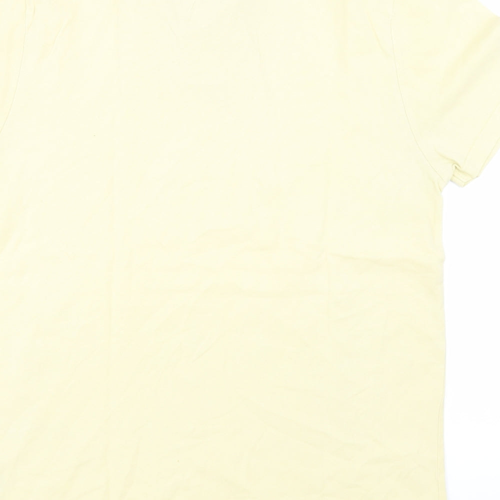 Brand and care label for Topman men’s yellow jersey polo, size L