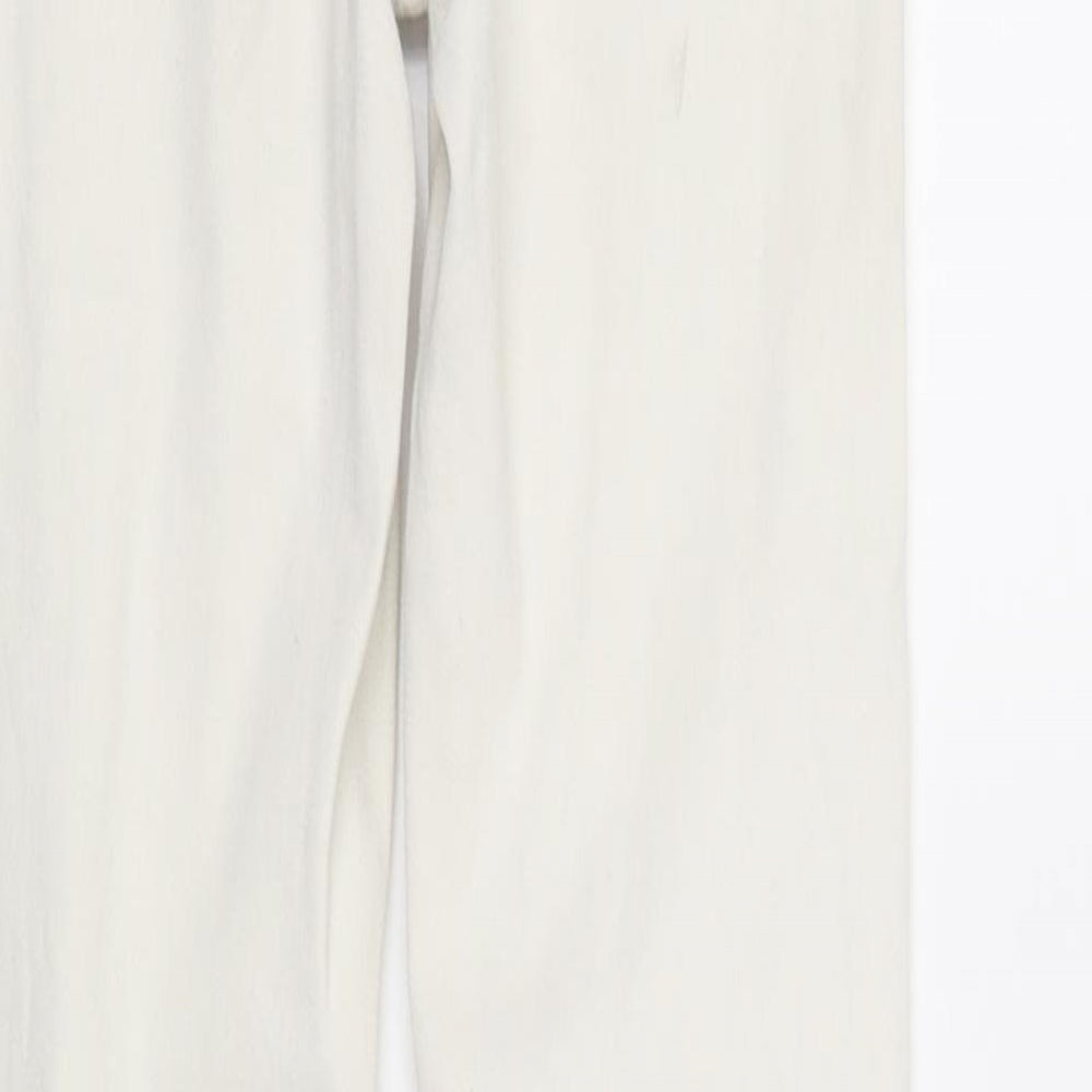 Brand and care label for River Island women’s white skinny jeans, size UK 6, 29-inch leg