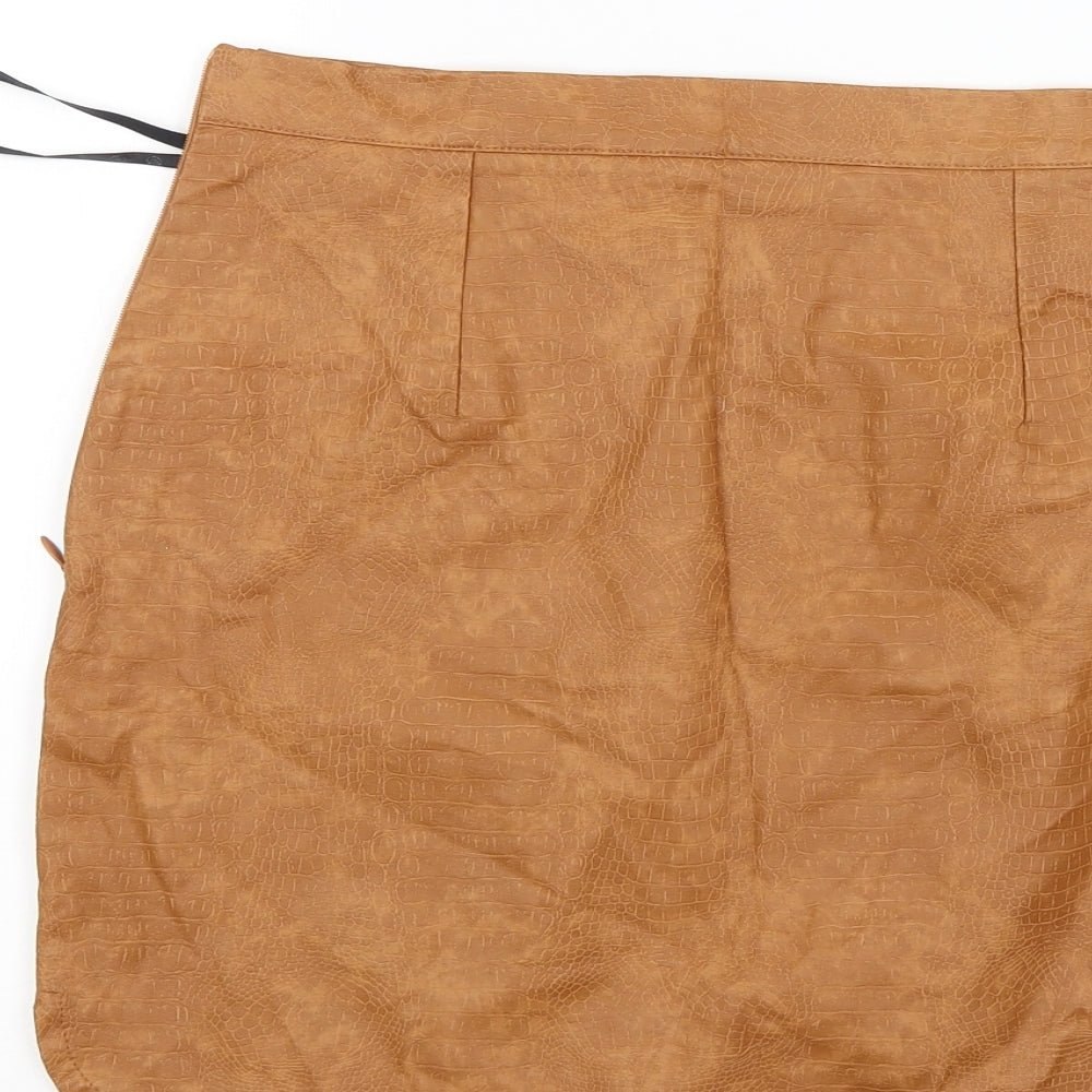 Brand and care label for Missguided women’s brown mini skirt, size UK 10