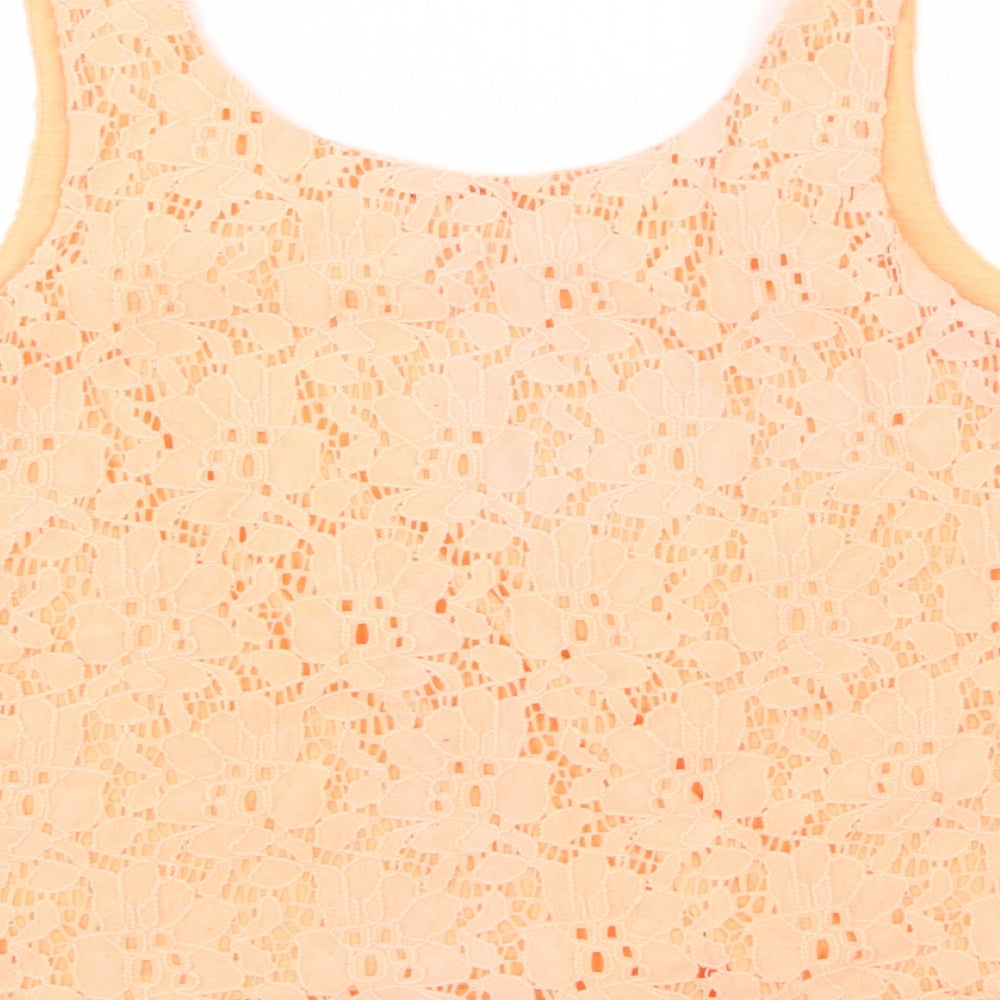 Brand and care label for Forever 21 women’s orange cropped t-shirt, size S
