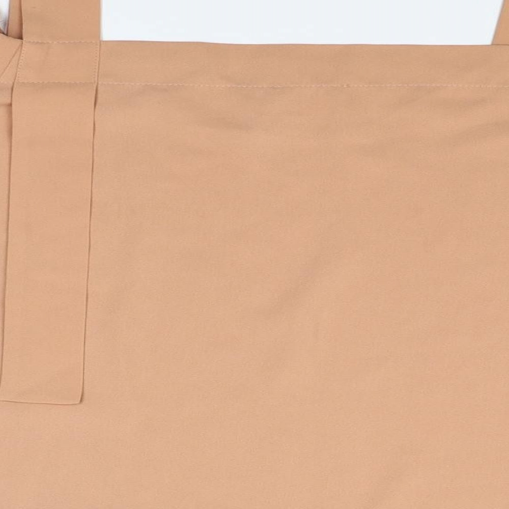 Brand and care label for ASOS women’s brown basic blouse, size UK 10