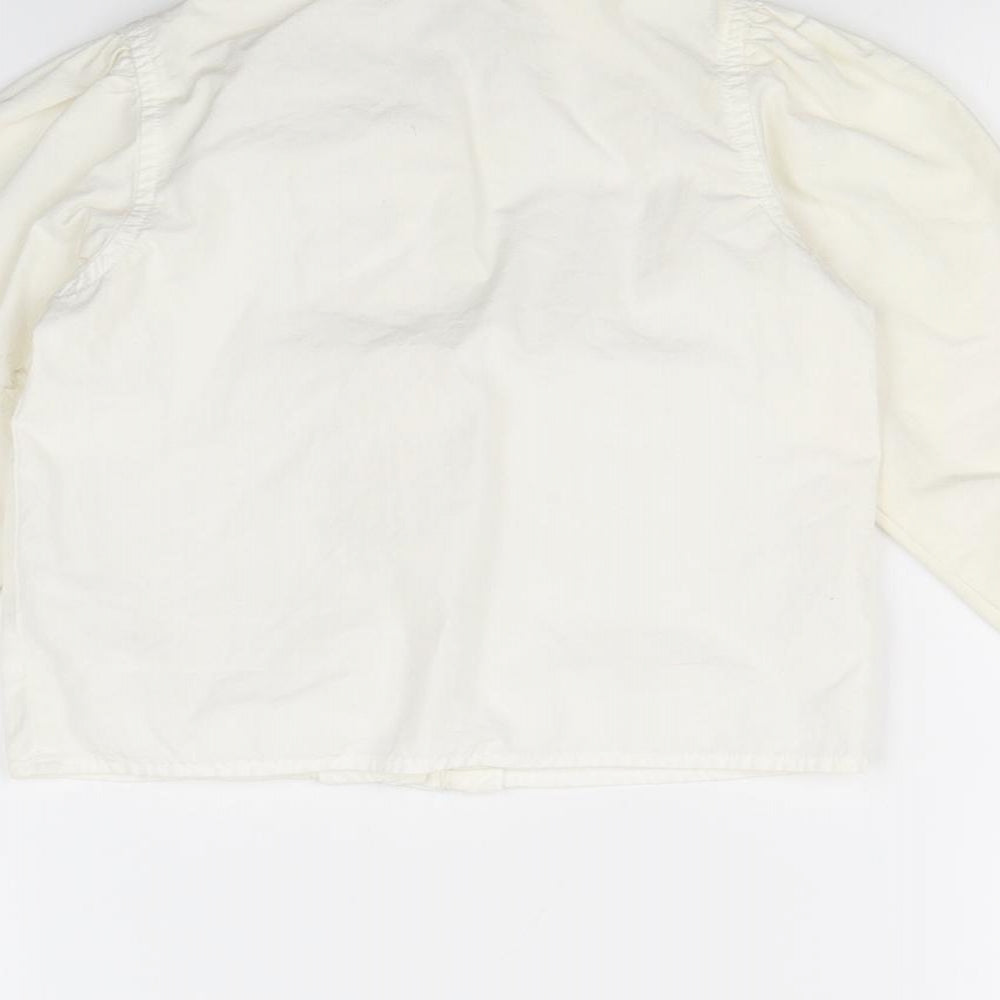 Brand and care label for Gap girls’ white basic button-up, size 2, years