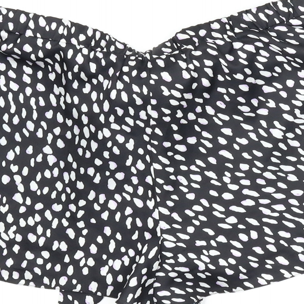 Brand and care label for New Look women’s black animal print capri sleep shorts, size UK 10