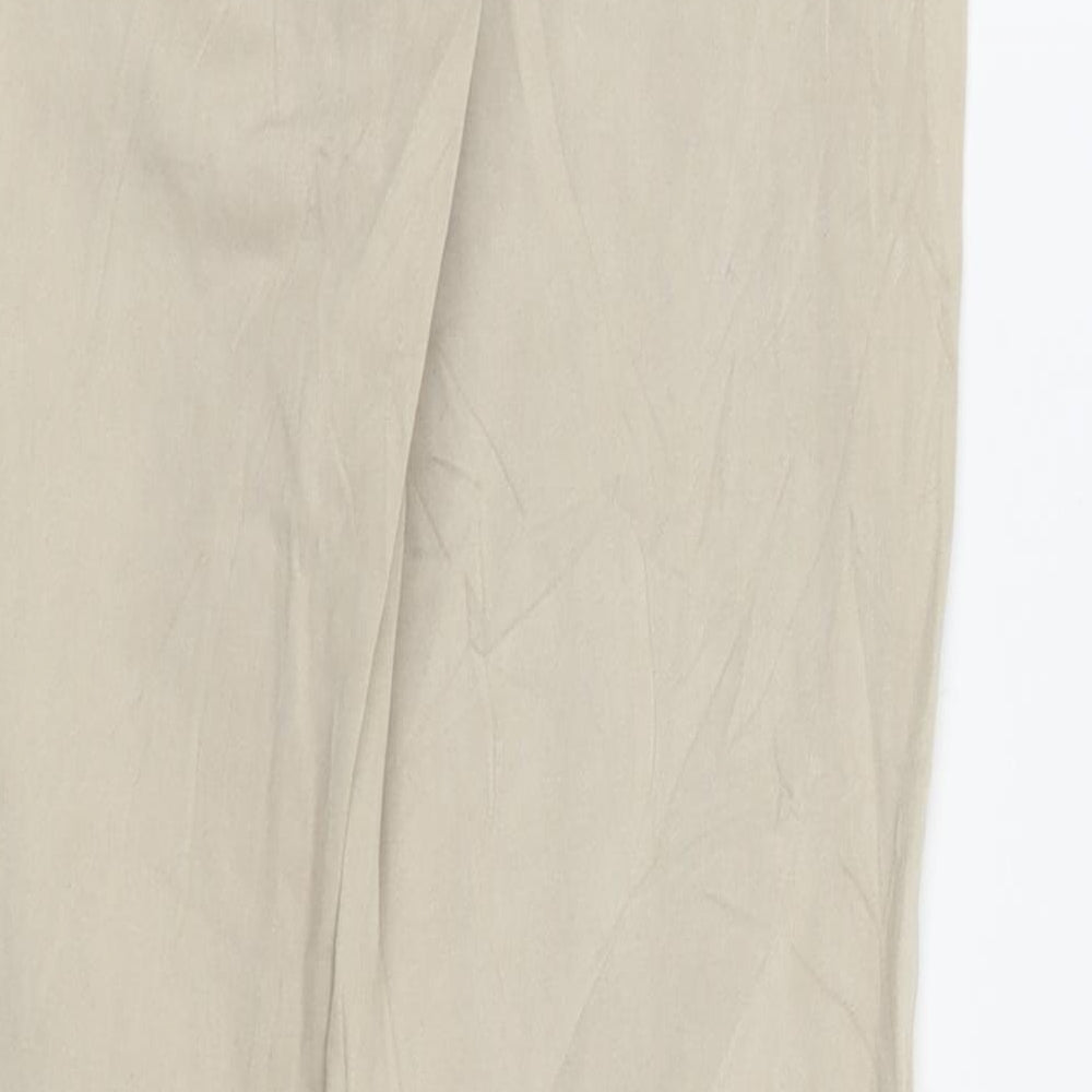 Brand and care label for lana wmen women’s beige skinny jeans, size UK 8, 27-inch leg