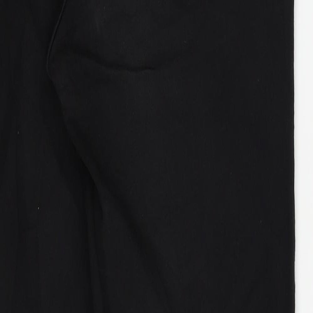 Brand and care label for Divided by H&M women’s black skinny jeans, size UK 26, in, 28-inch leg