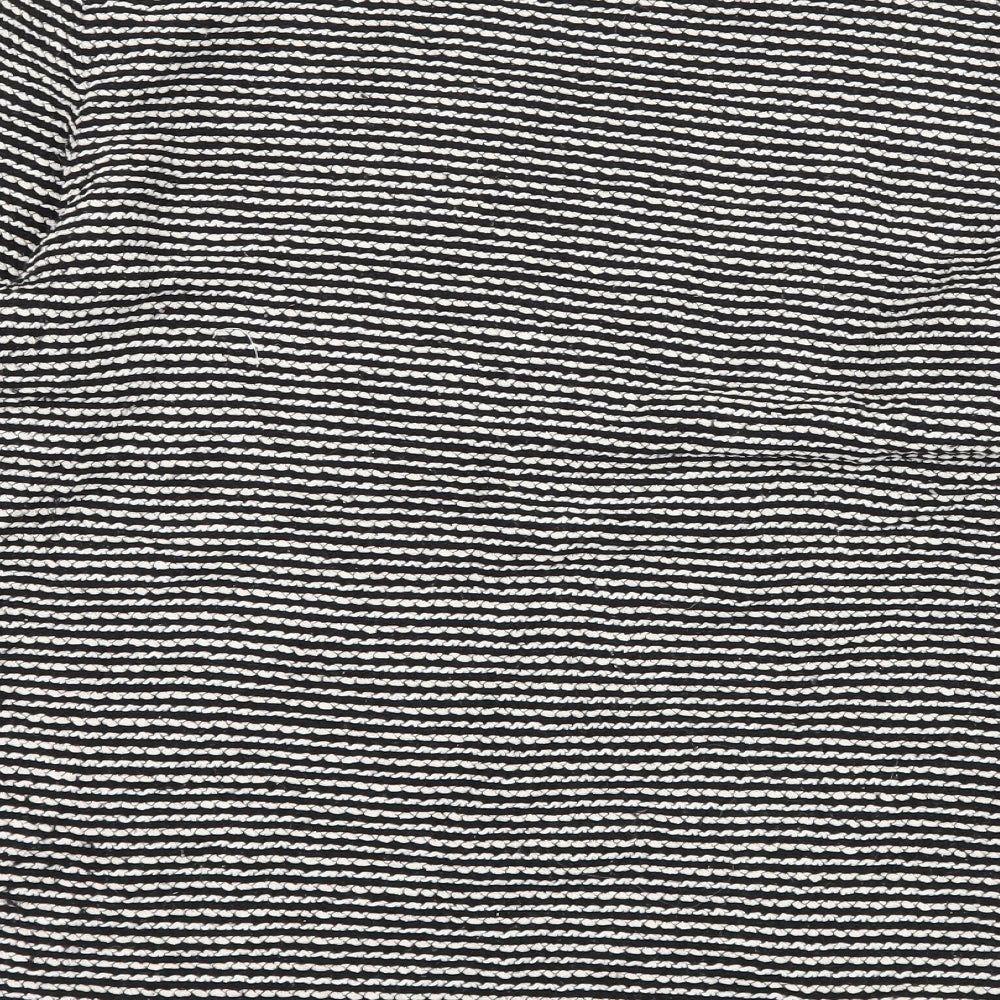 Brand and care label for H&M women’s black striped knit jumper, size M