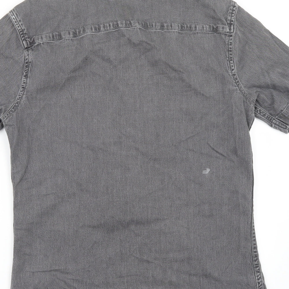 Brand and care label for Topman men’s gold button-up, size S