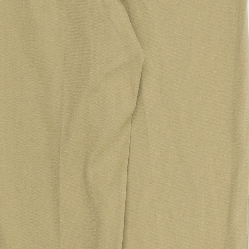 Brand and care label for Marks & Spencer women’s beige trousers, size UK 10, 25-inch leg