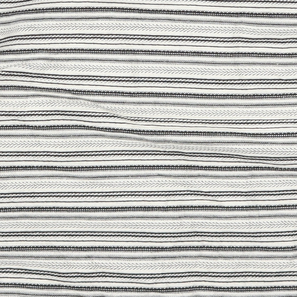 Brand and care label for Marks & Spencer women’s grey striped cardigan jumper, size UK 12