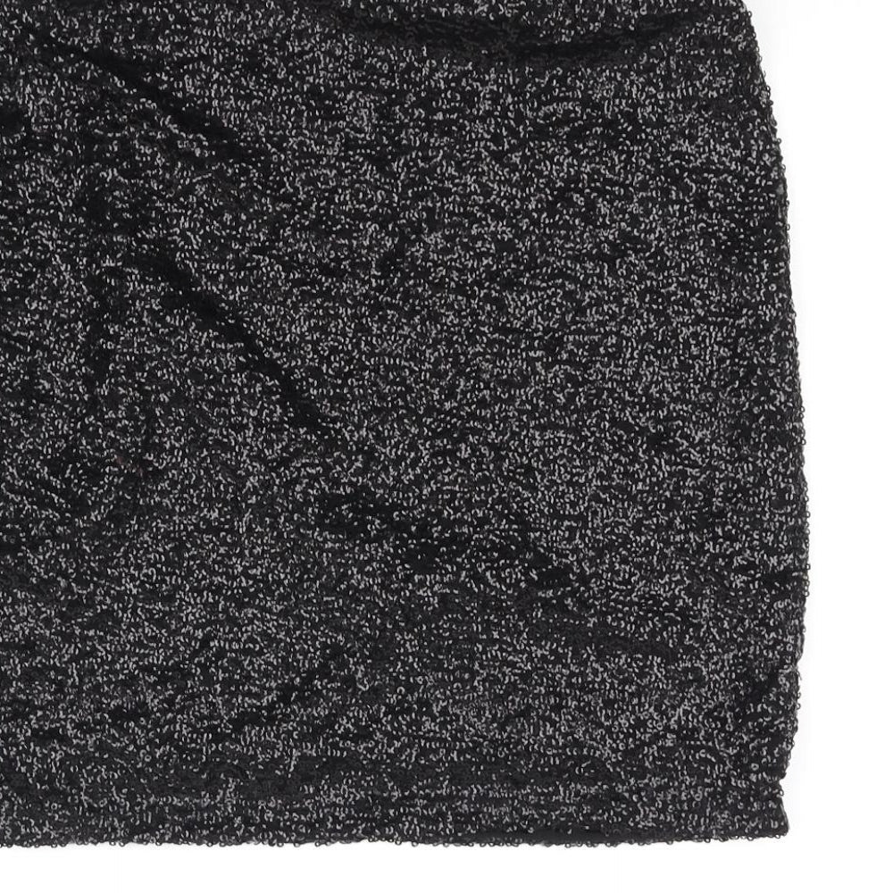 Brand and care label for Divided women’s black a-line skirt, size UK 8