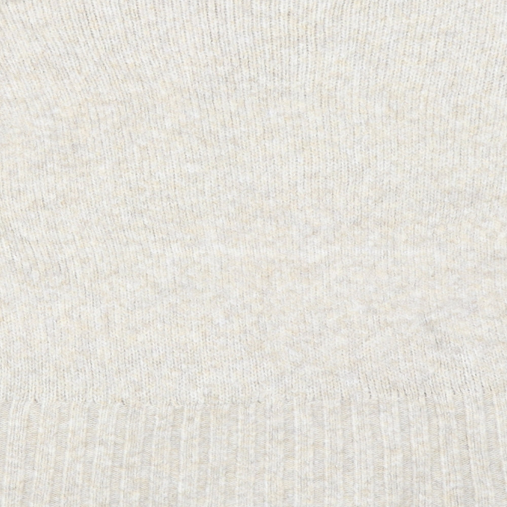 Brand and care label for New Look women’s beige jumper, size M