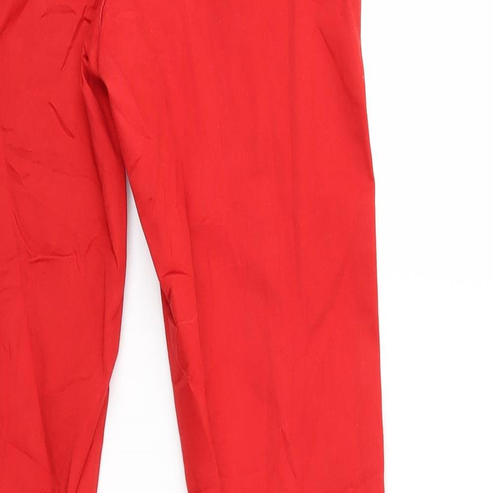 Brand and care label for Tregging Thea women’s red denim skinny jeans, size M, 29-inch leg