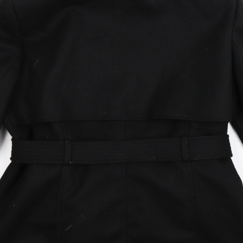 Brand and care label for Warehouse women’s black jacket, size UK 14