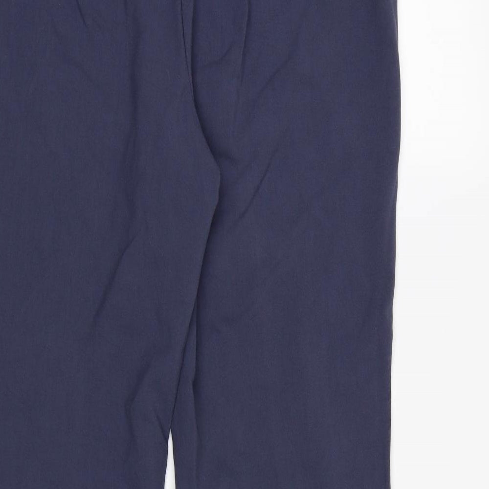 Brand and care label for Marks & Spencer women’s blue rayon dress pants trousers, size UK 14, 26-inch leg