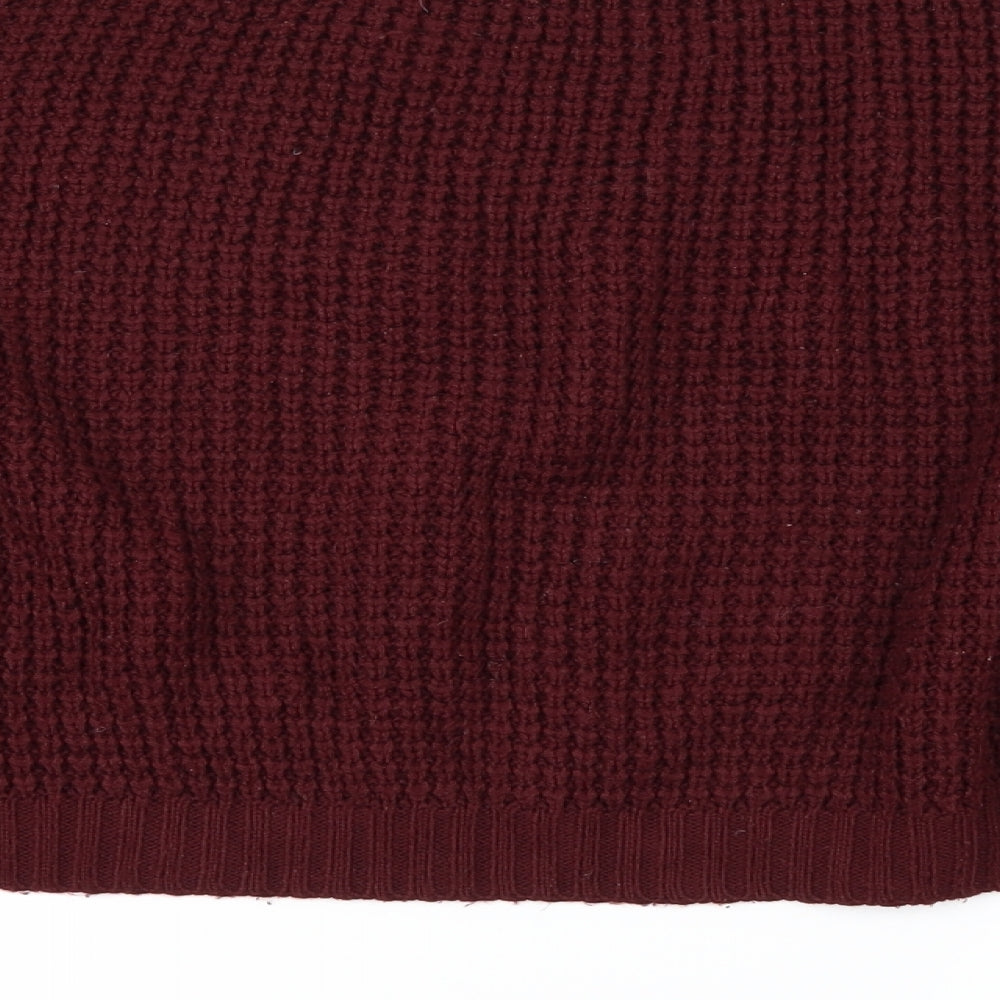Brand and care label for Topshop women’s red jumper, size UK 10