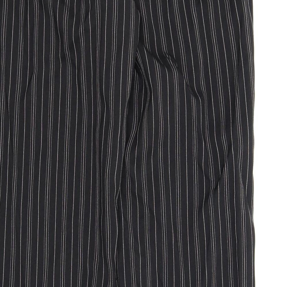 Brand and care label for La Redoute women’s black striped trousers, size UK 14, 32-inch leg