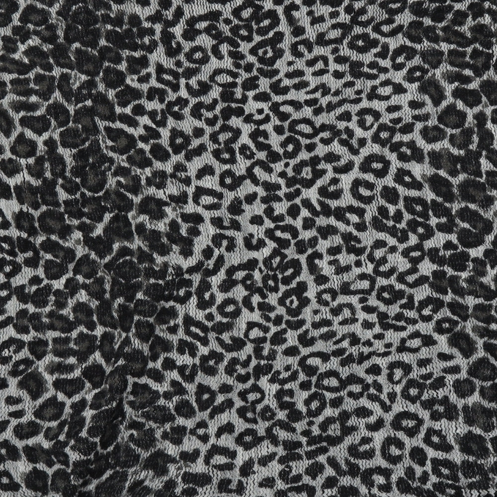Brand and care label for Preworn women’s black animal print cape jumper one size - fringe detail