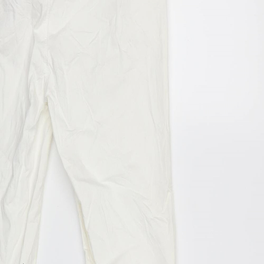 Brand and care label for M.A.P.P women’s white denim skinny jeans, size M, 27-inch leg